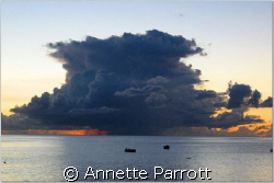Cumulonimbus.
Sunset.
Fishing boats in the distance. by Annette Parrott 